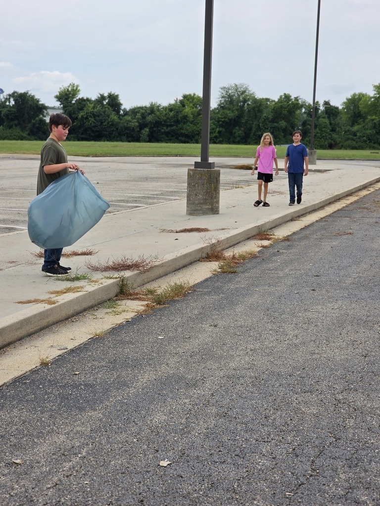 Middle school students get their building ready for the school year. 