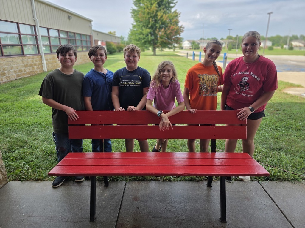 Middle school students get their building ready for the school year. 