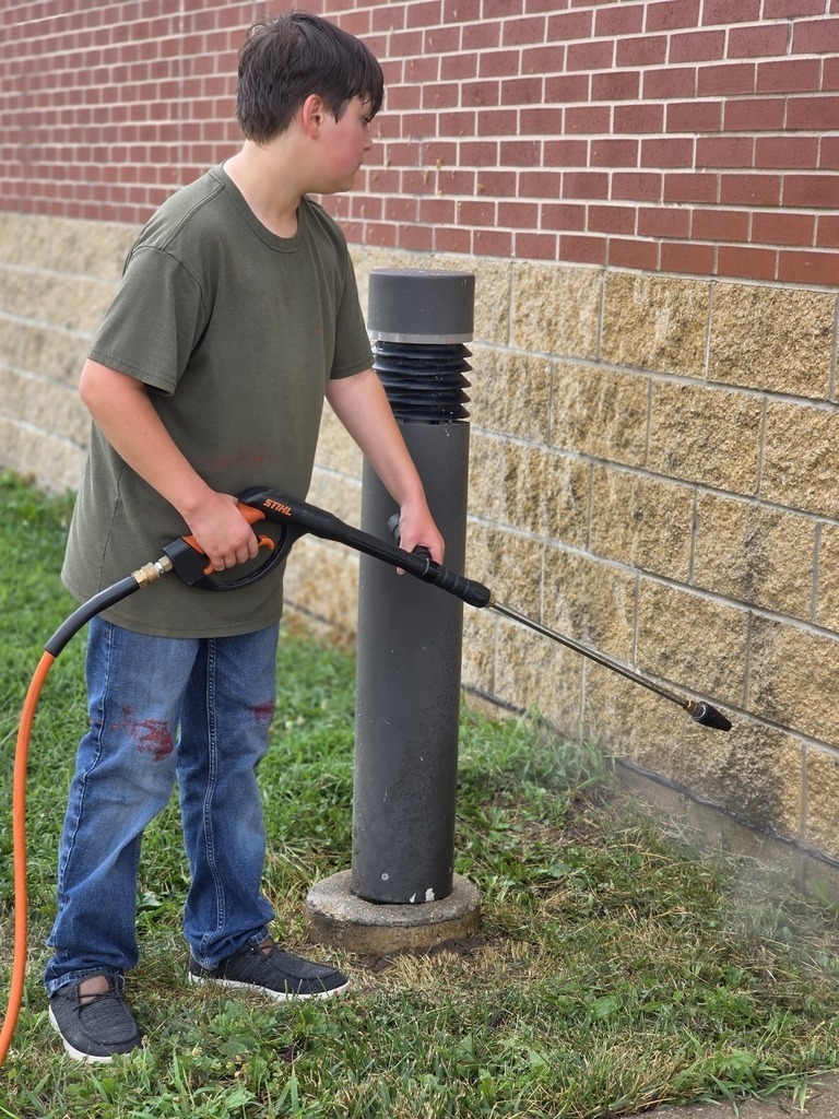 Middle school students get their building ready for the school year. 