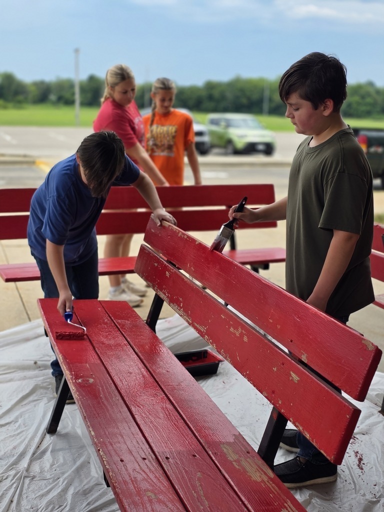 Middle school students get their building ready for the school year. 