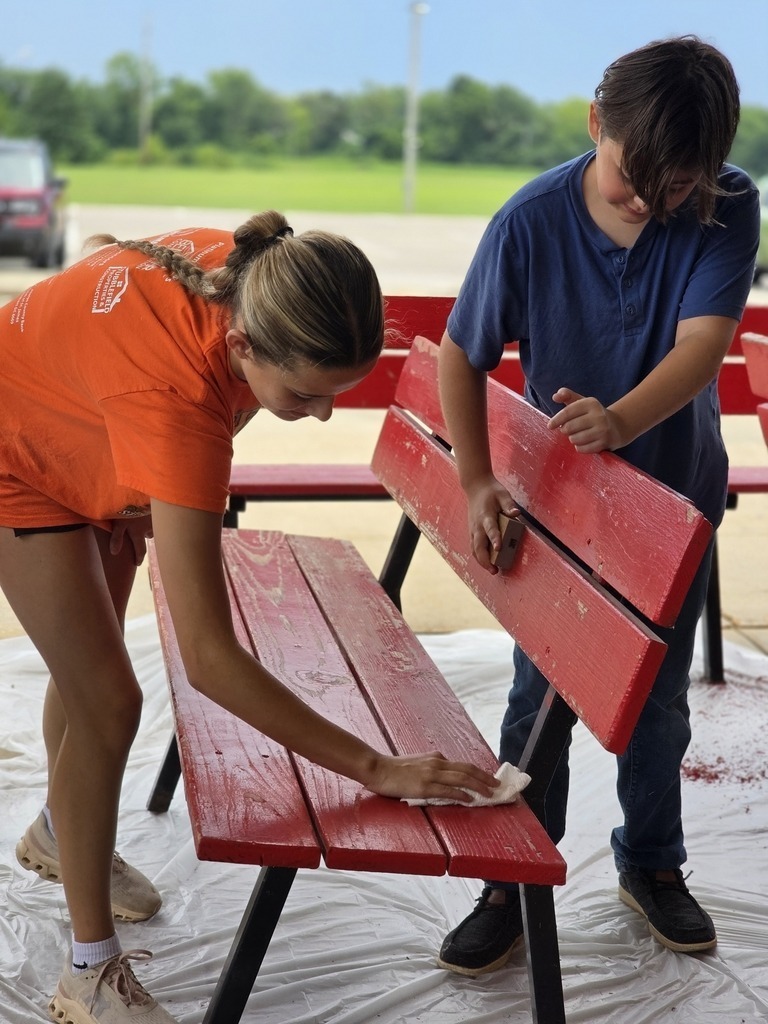 Middle school students get their building ready for the school year. 