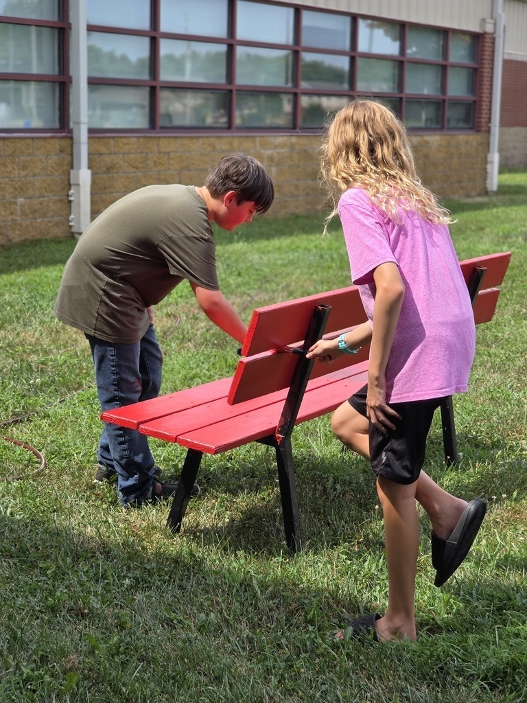 Middle school students get their building ready for the school year. 