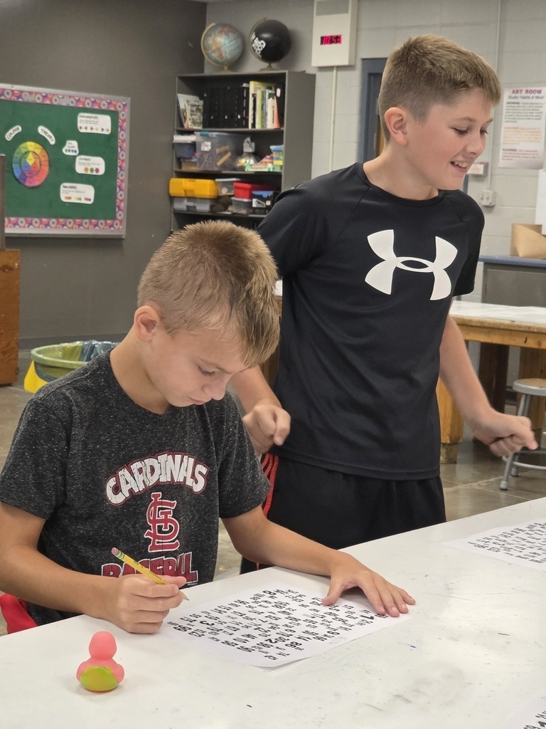 Middle school students work on critical thinking skills in math with a dice game. 