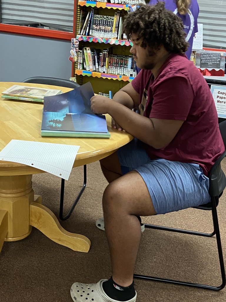 Creative writing students at St. James high school learn about picture books!