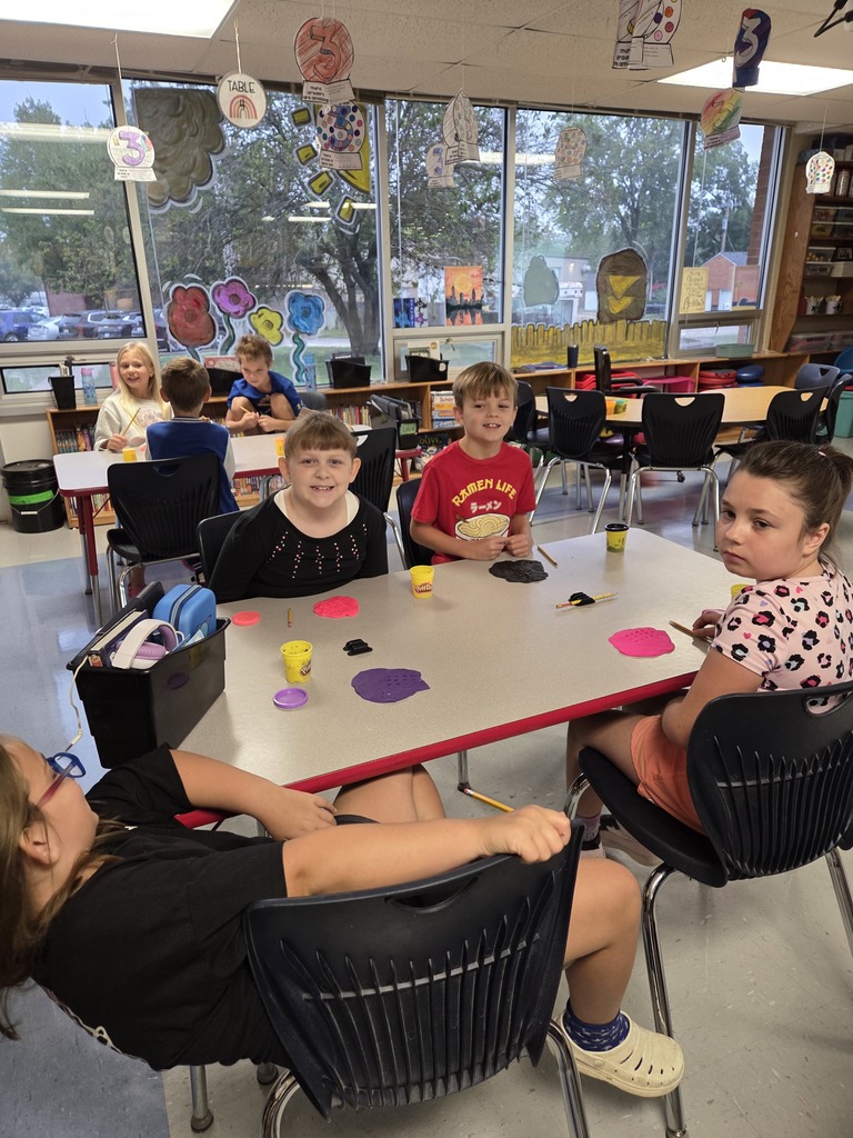 Third grade practices multiplication by creating arrays with play-dough.