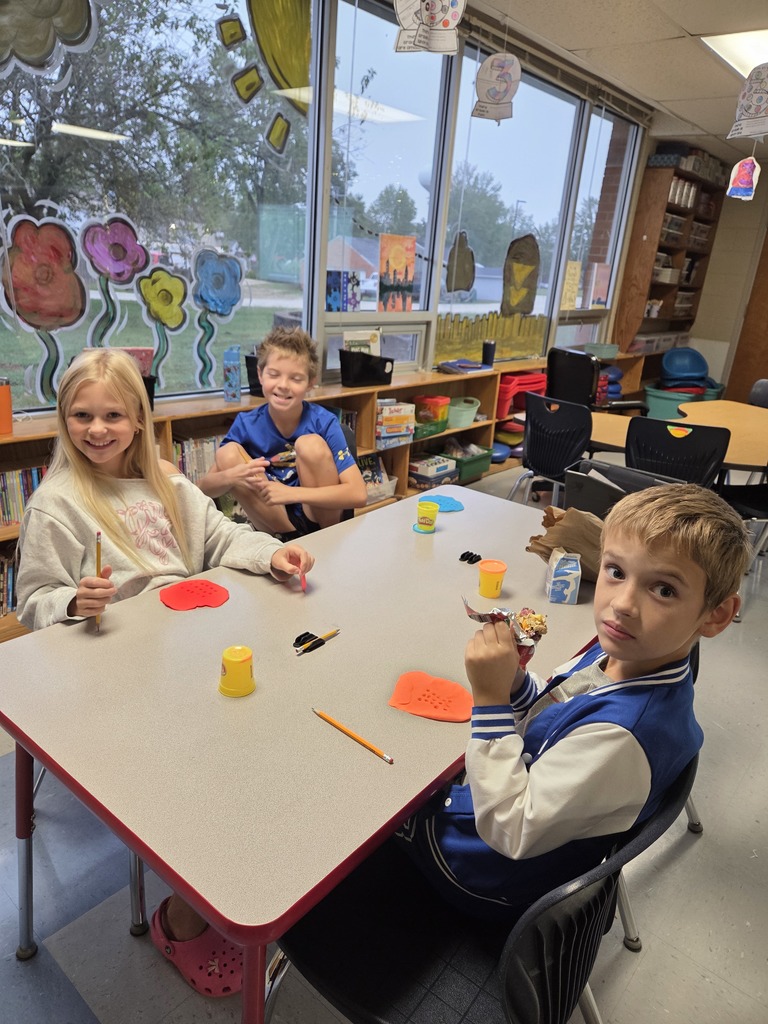 Third grade practices multiplication by creating arrays with play-dough.