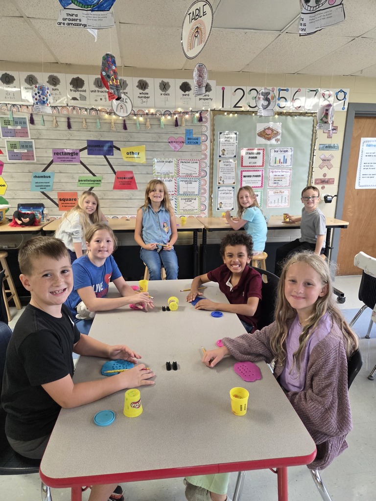 Third grade practices multiplication by creating arrays with play-dough.
