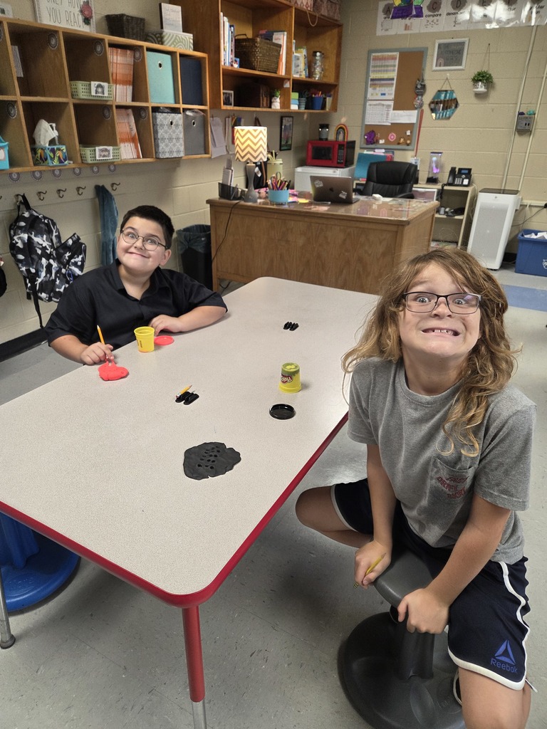 Third grade practices multiplication by creating arrays with play-dough.