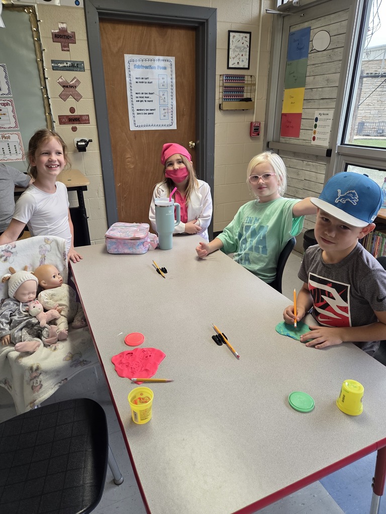 Third grade practices multiplication by creating arrays with play-dough.