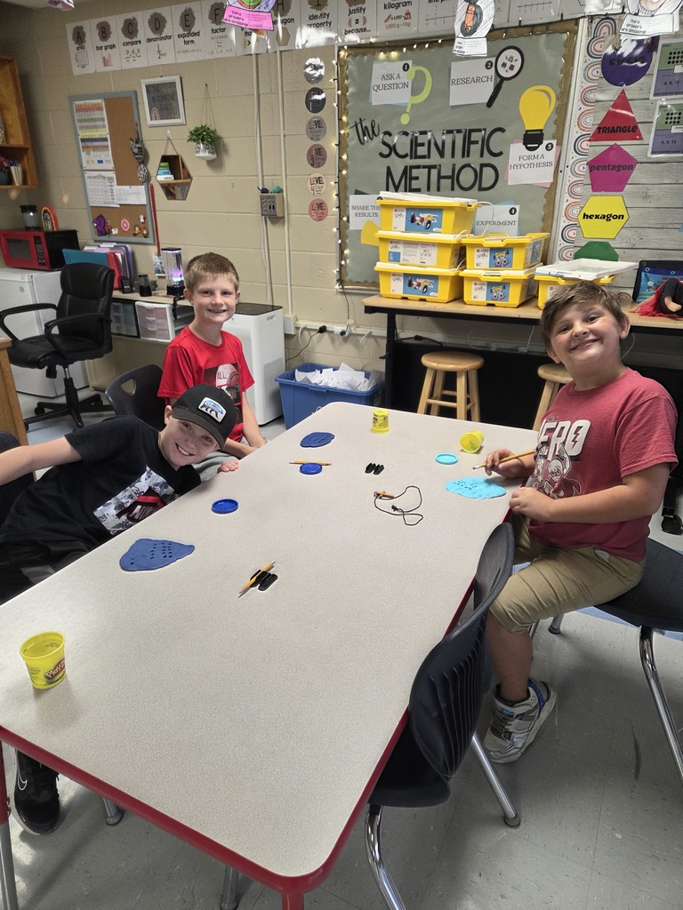 Third grade practices multiplication by creating arrays with play-dough.