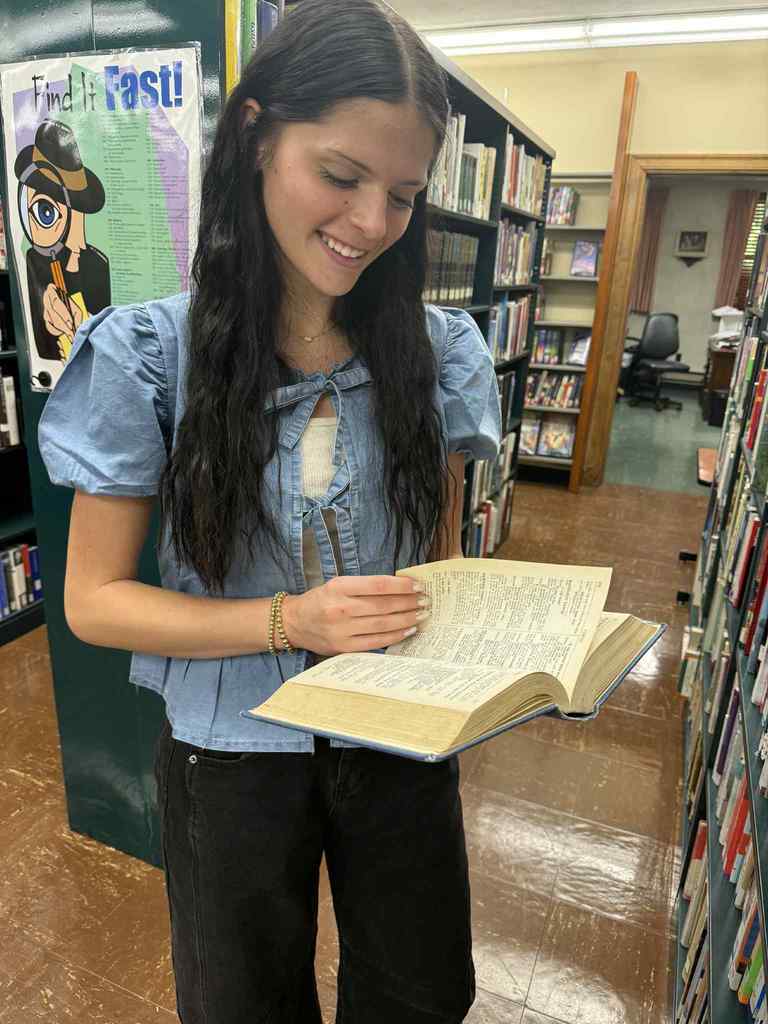 High school students discover public library resources on a recent trip to the James Memorial Public Library.