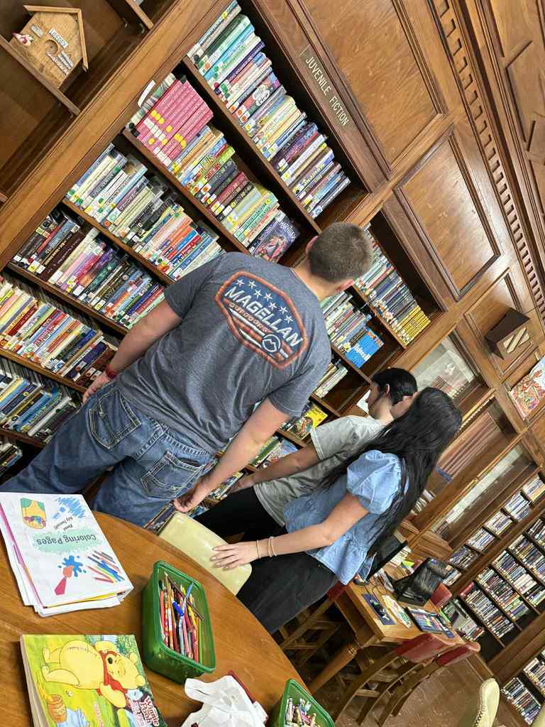 High school students discover public library resources on a recent trip to the James Memorial Public Library.