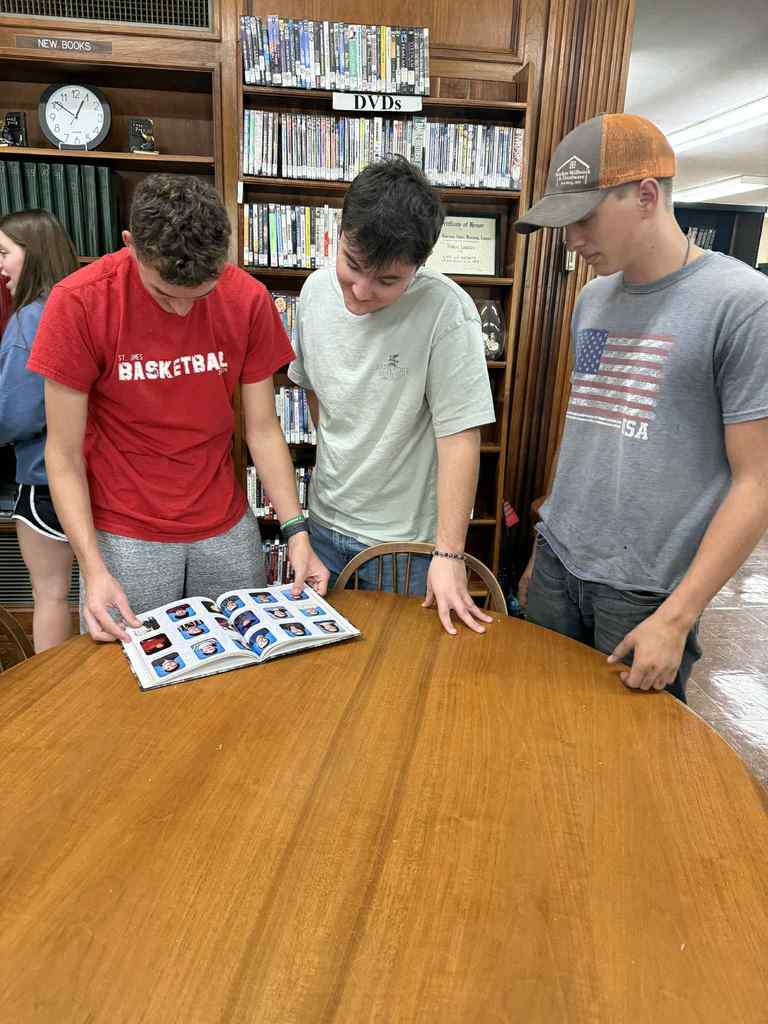 High school students discover public library resources on a recent trip to the James Memorial Public Library.