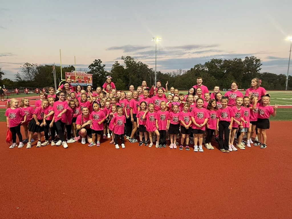 Pink Out Kiddy Camp performed before the varsity football camp on Friday night. 