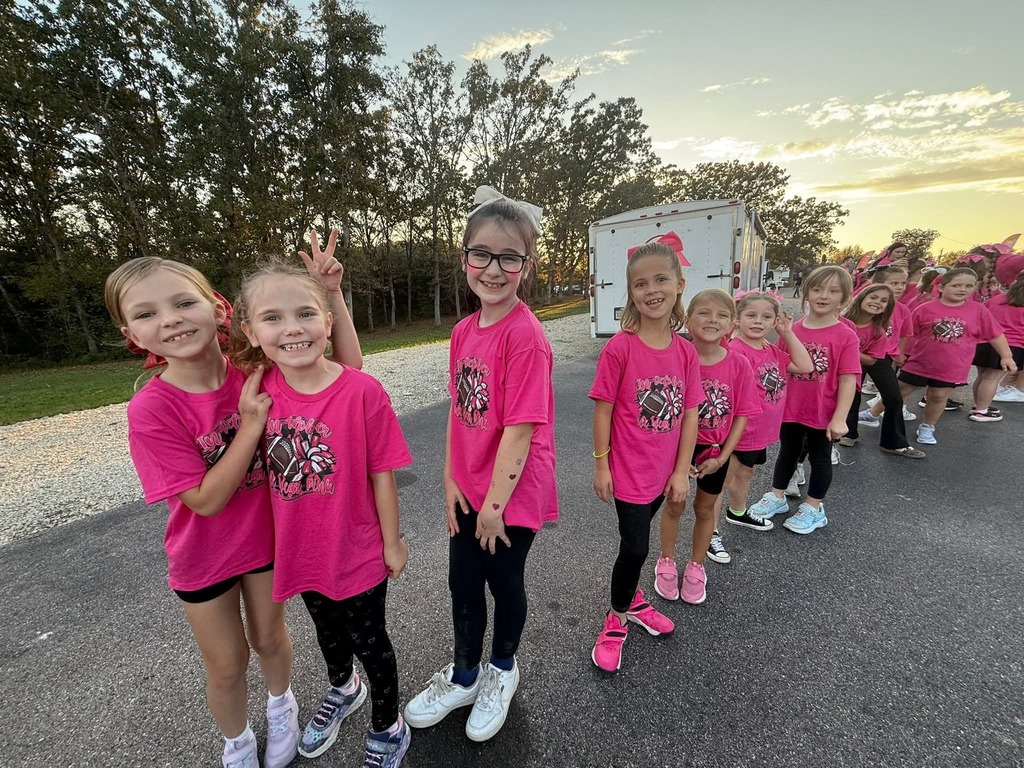Pink Out Kiddy Camp performed before the varsity football camp on Friday night. 