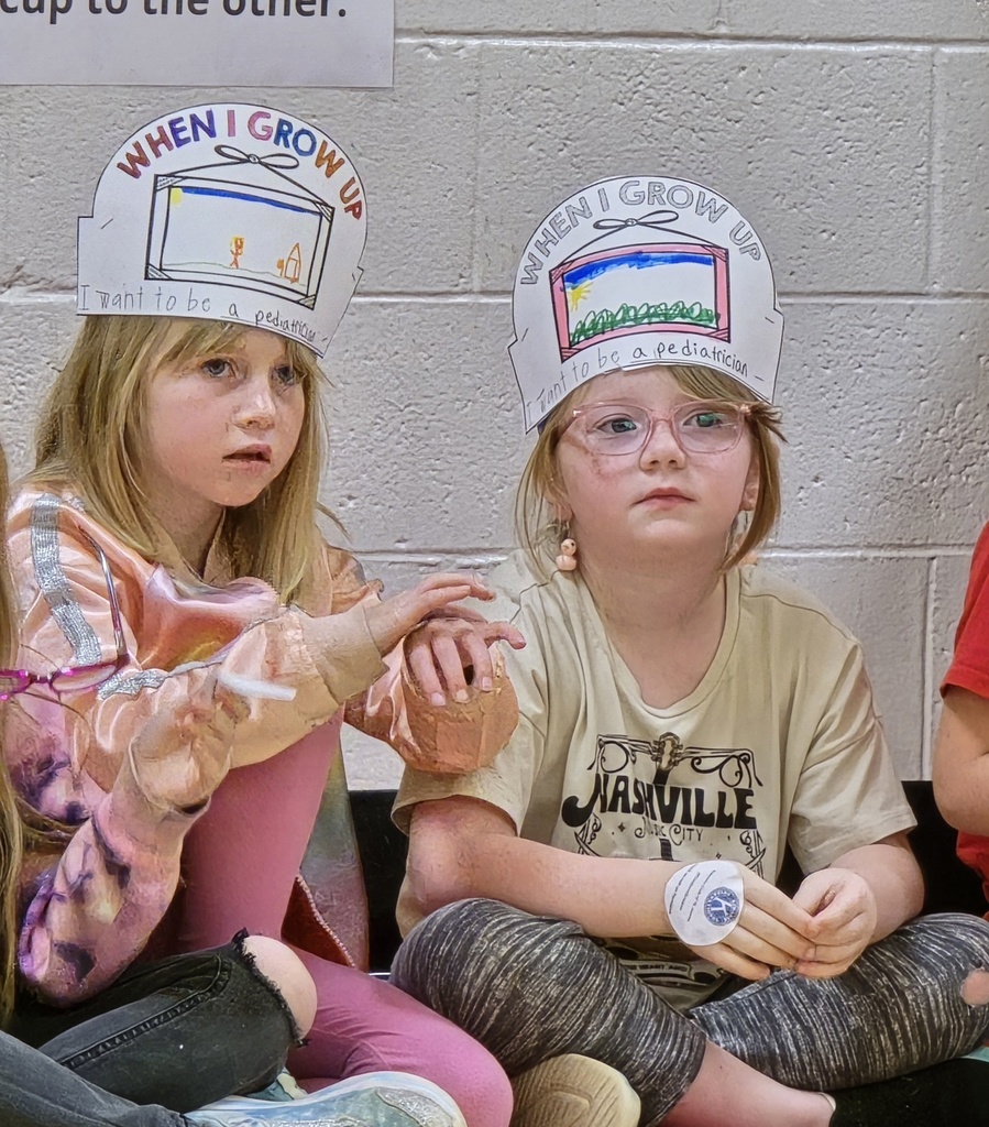 First grade tours the community and hears from guest speakers about their careers. 