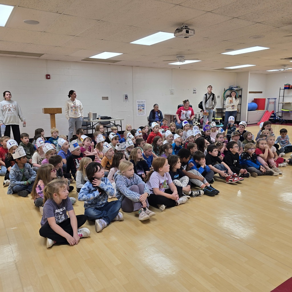 First grade tours the community and hears from guest speakers about their careers. 