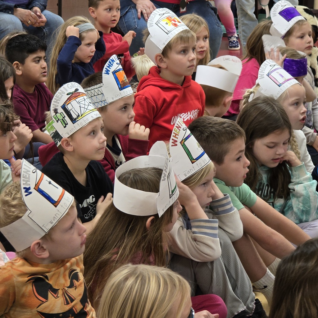 First grade tours the community and hears from guest speakers about their careers. 