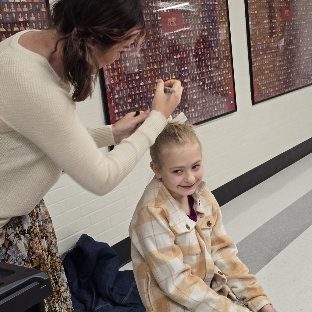 Students have Boo Buns in their hair after visiting Jumpstart Tigers!