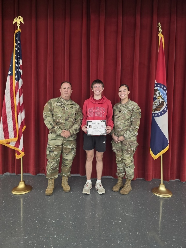 Middle School Army Value winners pose with representatives from Fort Leonard Wood. 