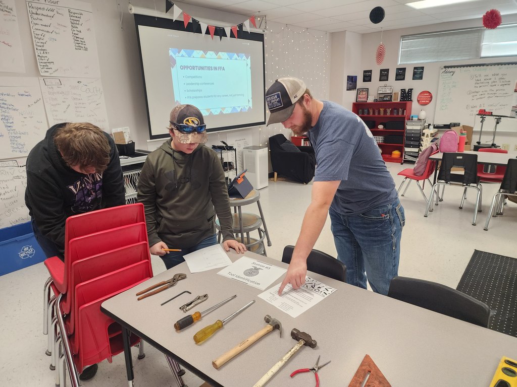 HS FFA visits middle school classes.