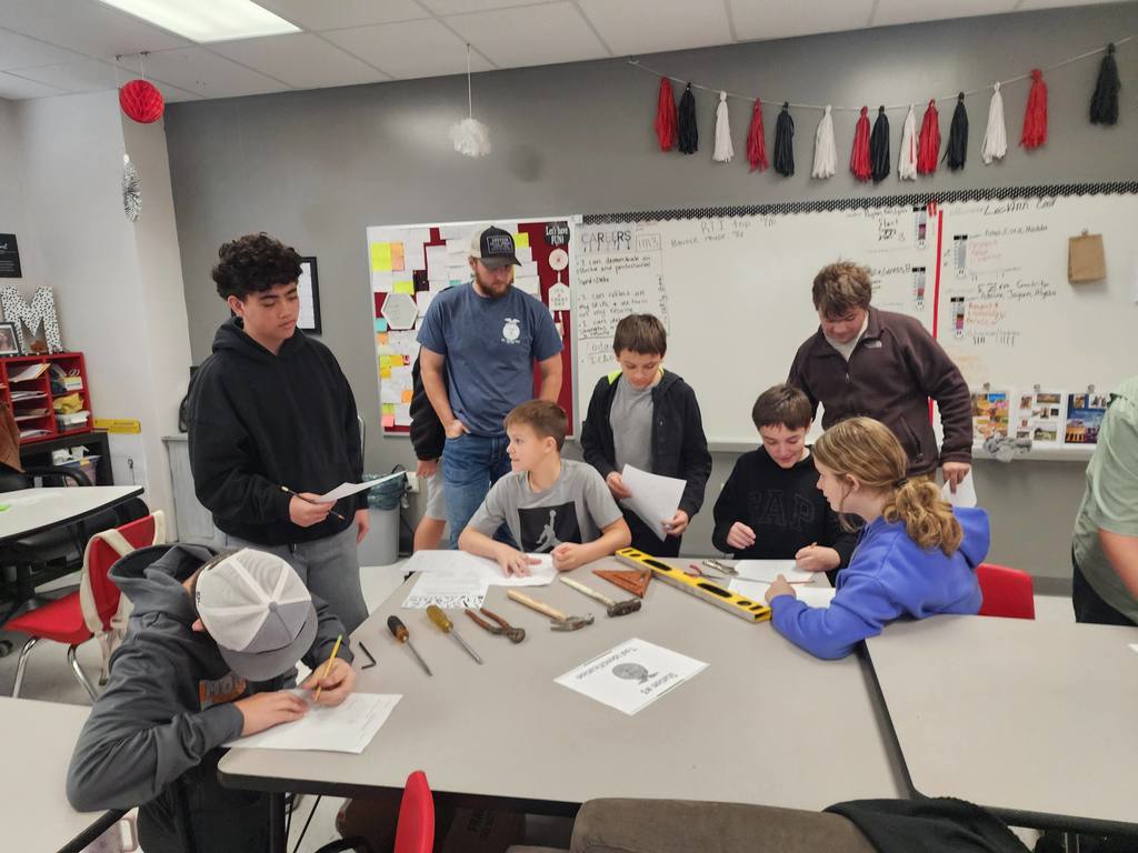 HS FFA visits middle school classes.