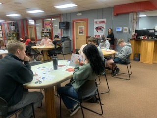 Students work on their Cubism art project.