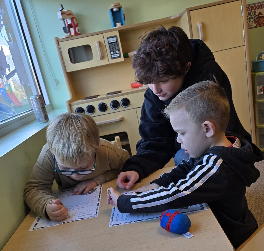 Senior Beta students help Tiger Cubs write Santa letters. 