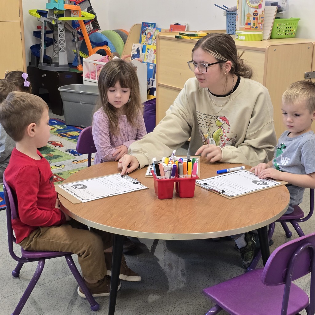 Senior Beta students help Tiger Cubs write Santa letters. 