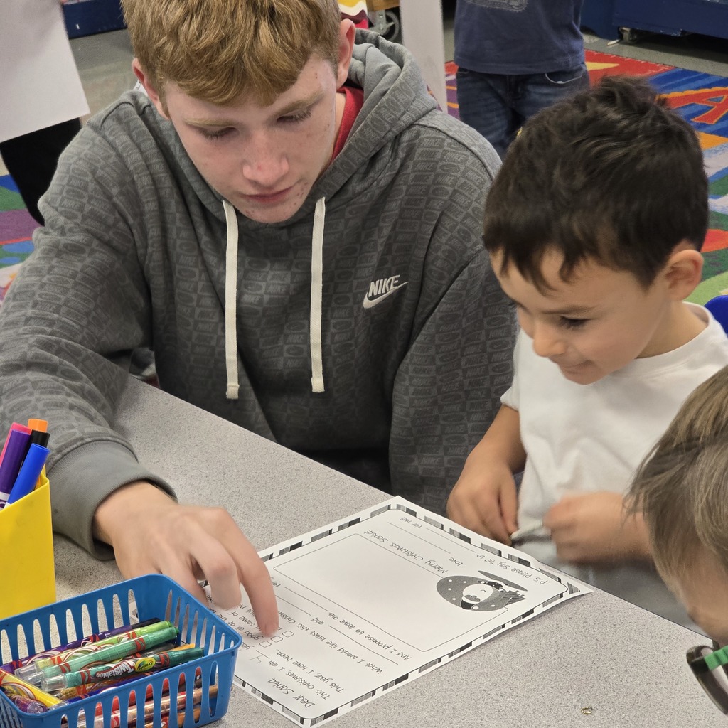 Senior Beta students help Tiger Cubs write Santa letters. 