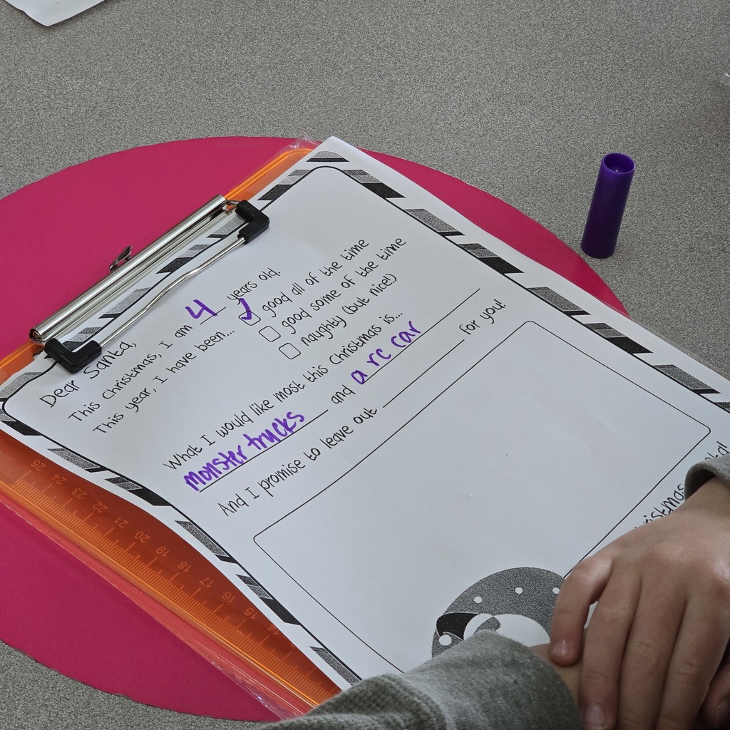 Senior Beta students help Tiger Cubs write Santa letters. 