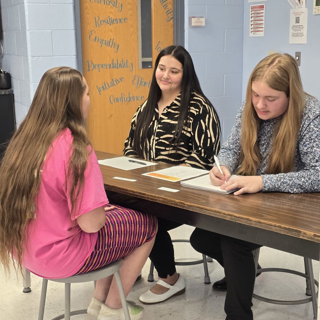 Middle school students work on interview skills with high school DECA and FBLA students!