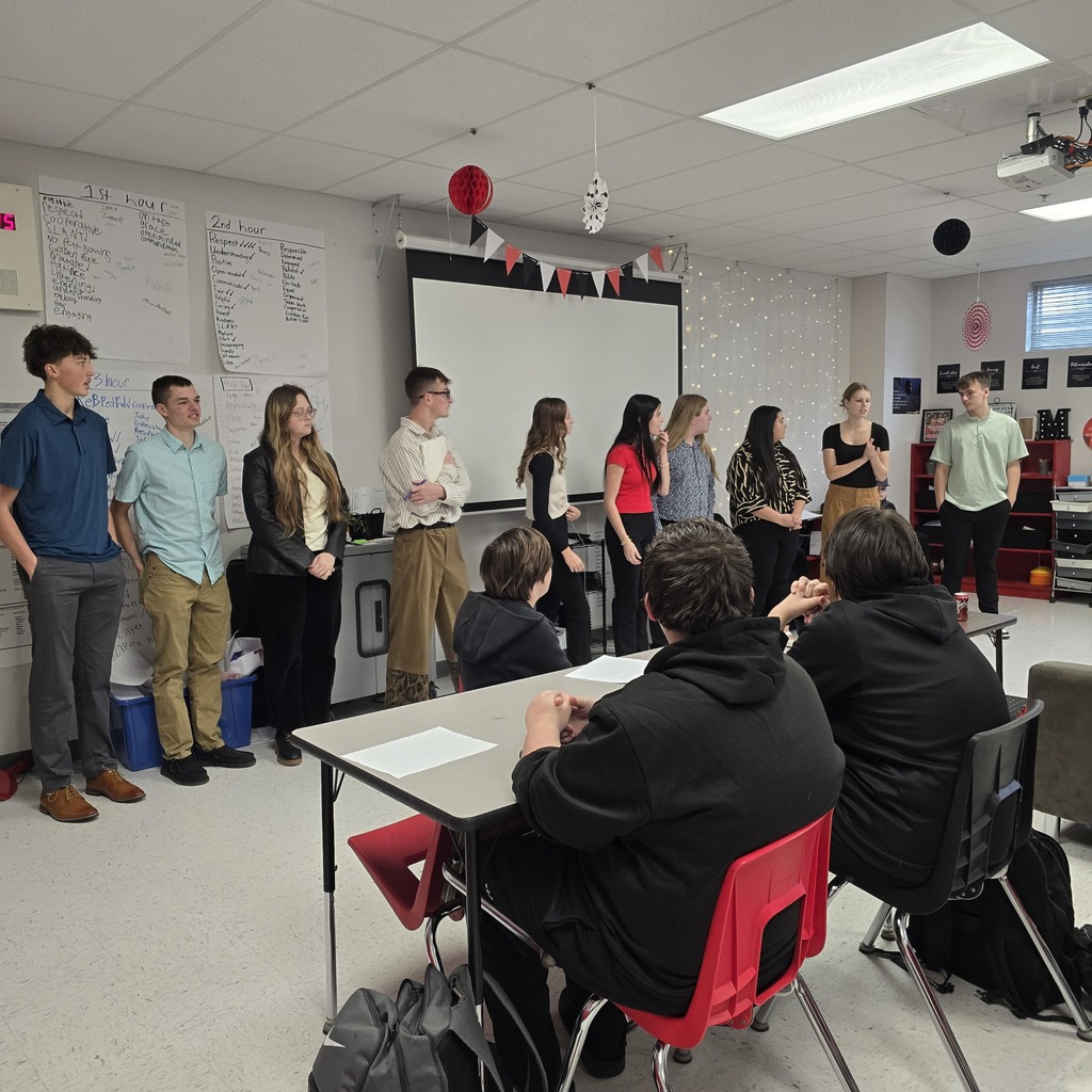 Middle school students work on interview skills with high school DECA and FBLA students!