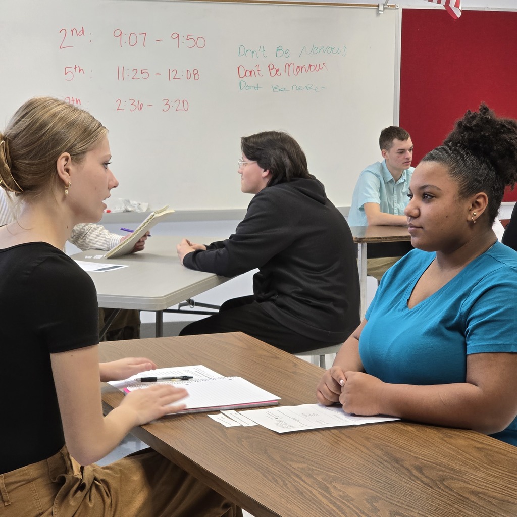 Middle school students work on interview skills with high school DECA and FBLA students!