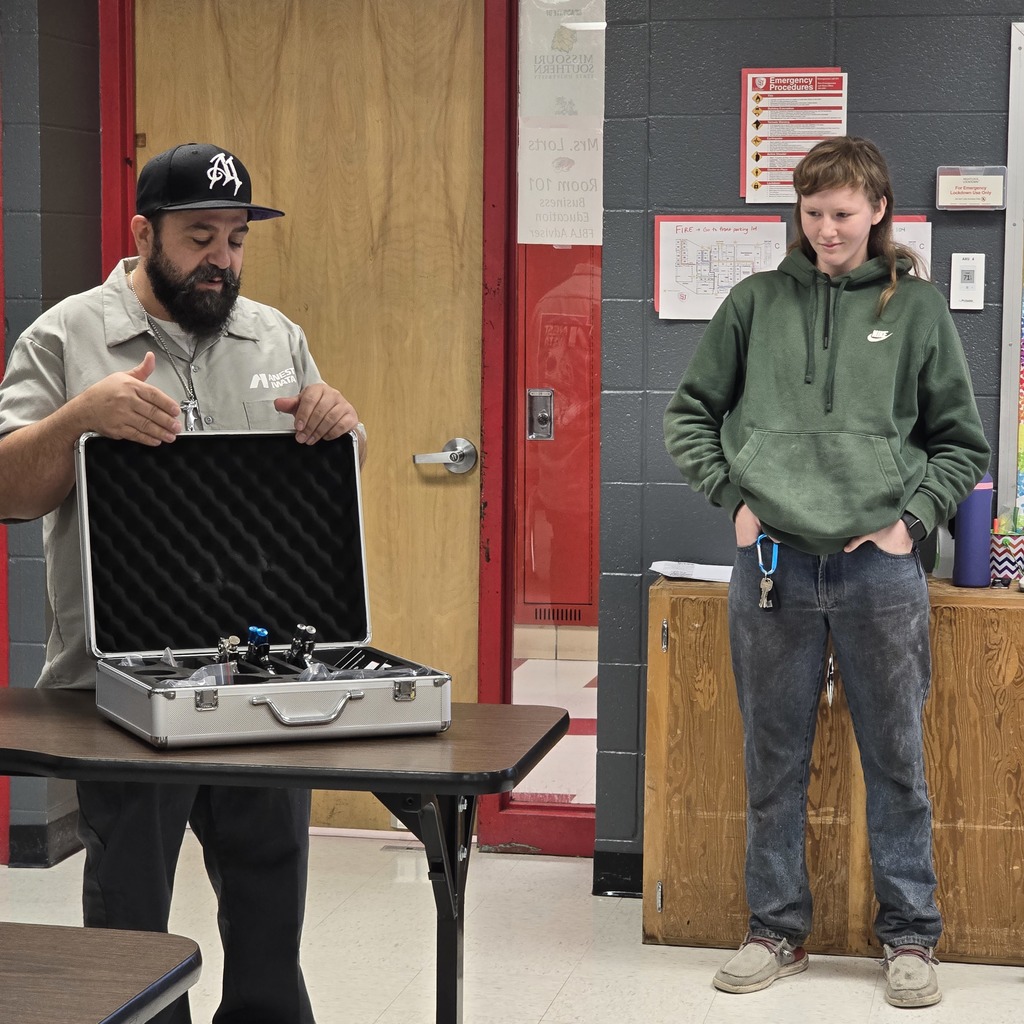 Student surprised by company with a care package!