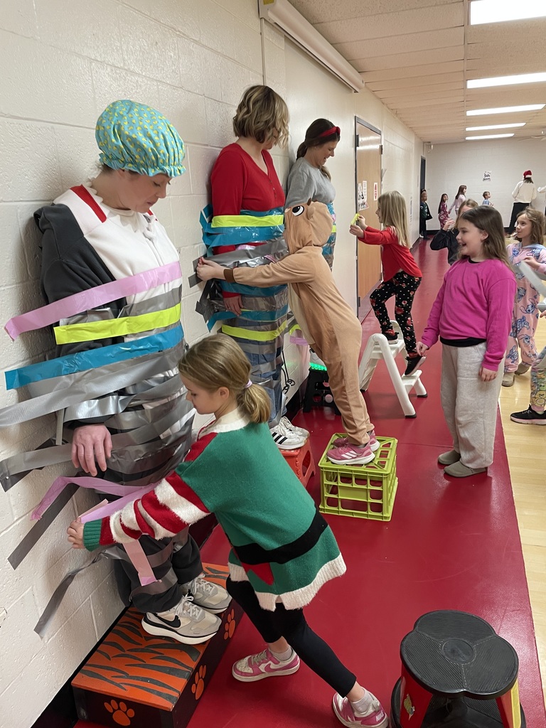 When Attendance Really Sticks! The principals were taped to the wall by students who had 93% attendance or higher.