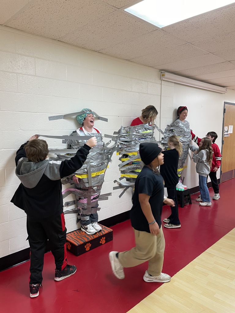 When Attendance Really Sticks! The principals were taped to the wall by students who had 93% attendance or higher.
