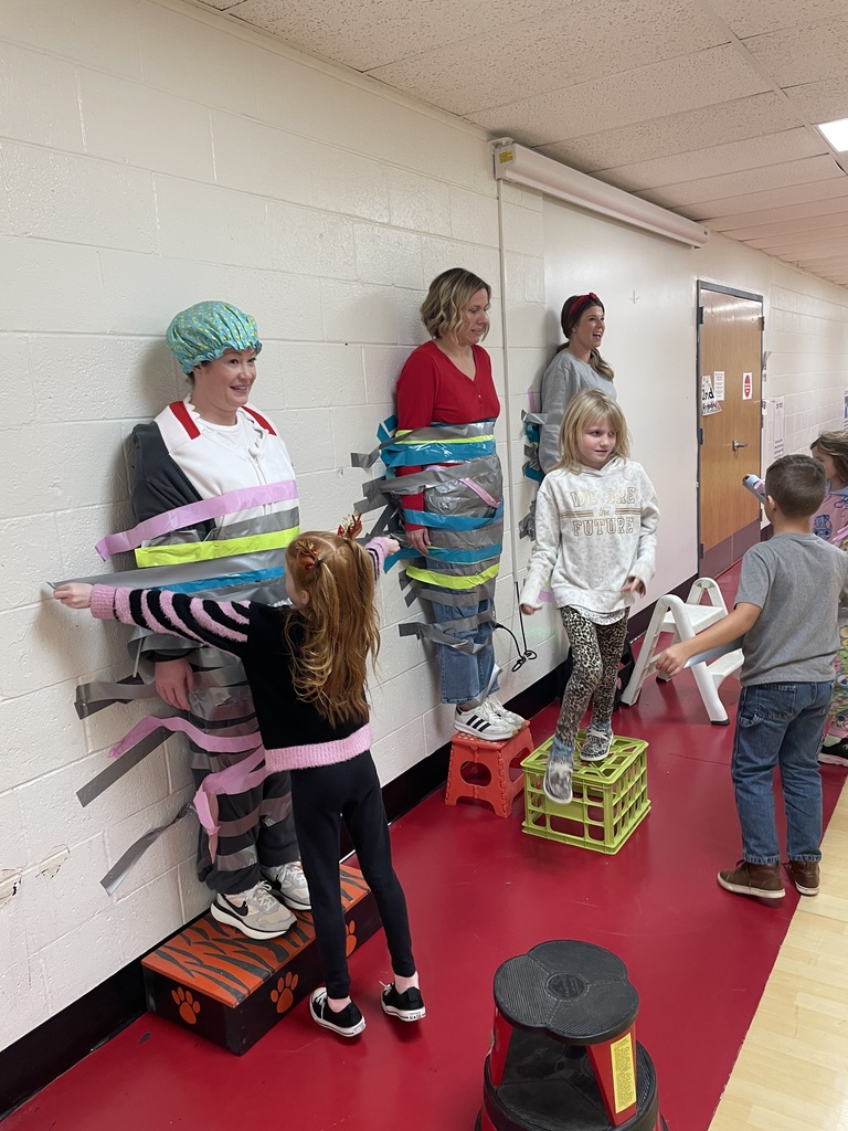 When Attendance Really Sticks! The principals were taped to the wall by students who had 93% attendance or higher.