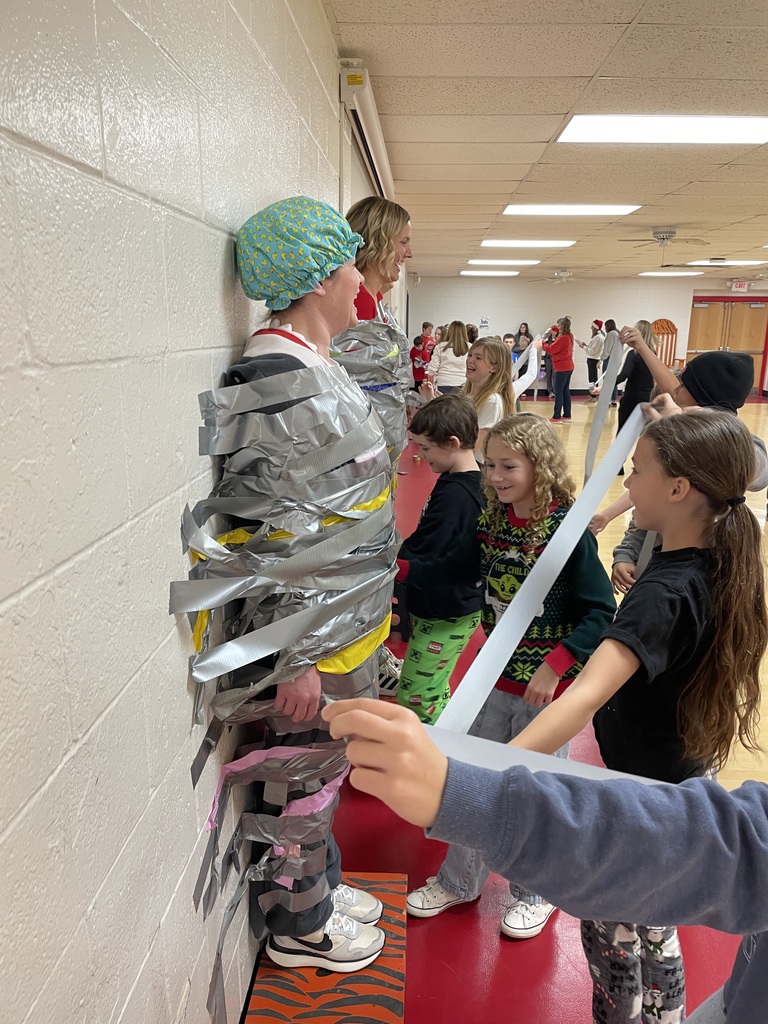 When Attendance Really Sticks! The principals were taped to the wall by students who had 93% attendance or higher.