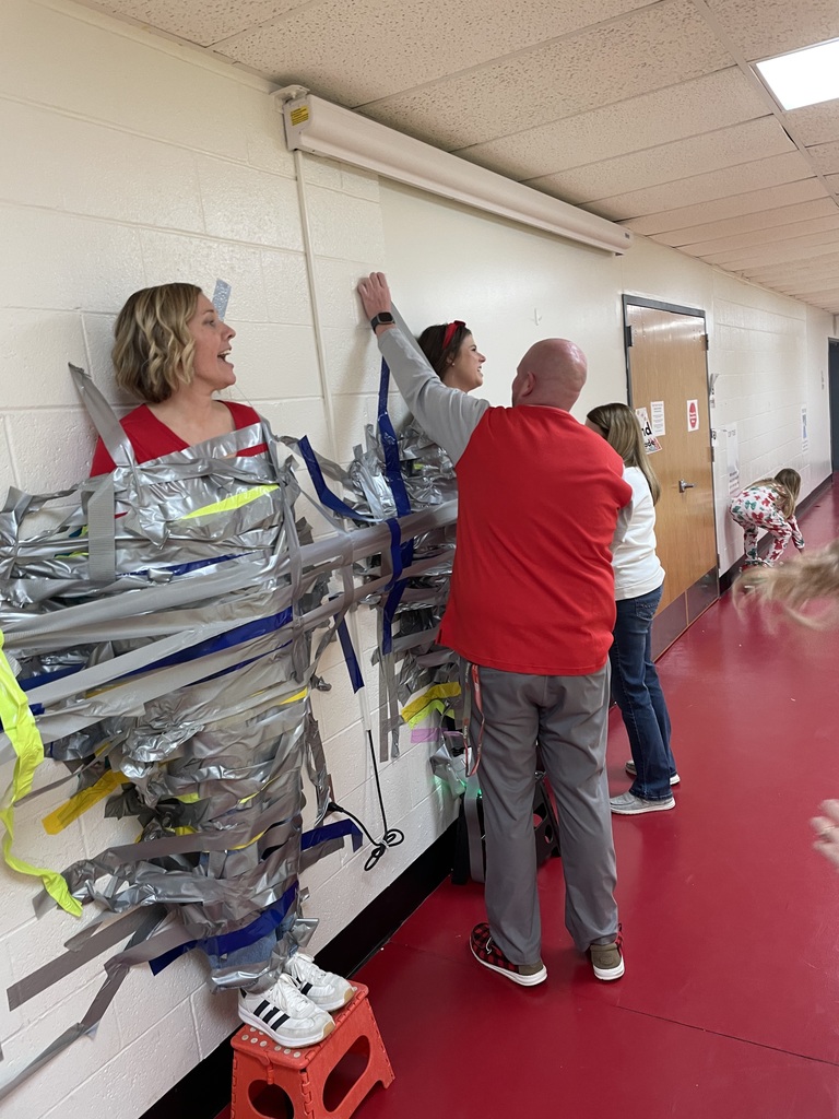 When Attendance Really Sticks! The principals were taped to the wall by students who had 93% attendance or higher.