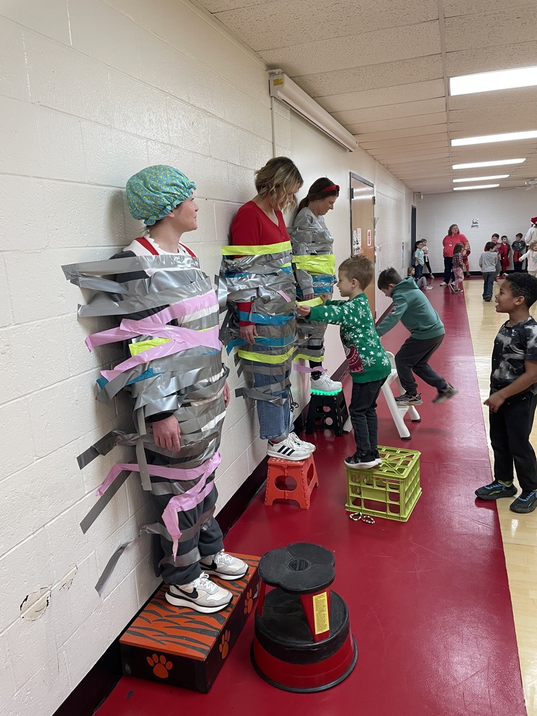 When Attendance Really Sticks! The principals were taped to the wall by students who had 93% attendance or higher.