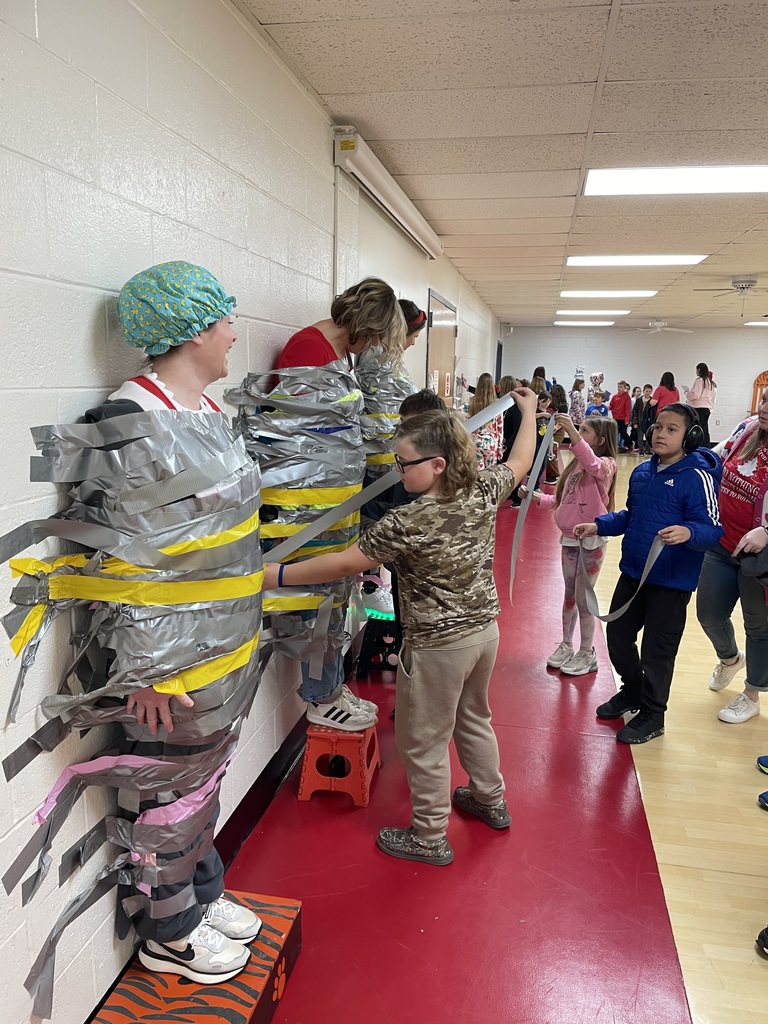 When Attendance Really Sticks! The principals were taped to the wall by students who had 93% attendance or higher.