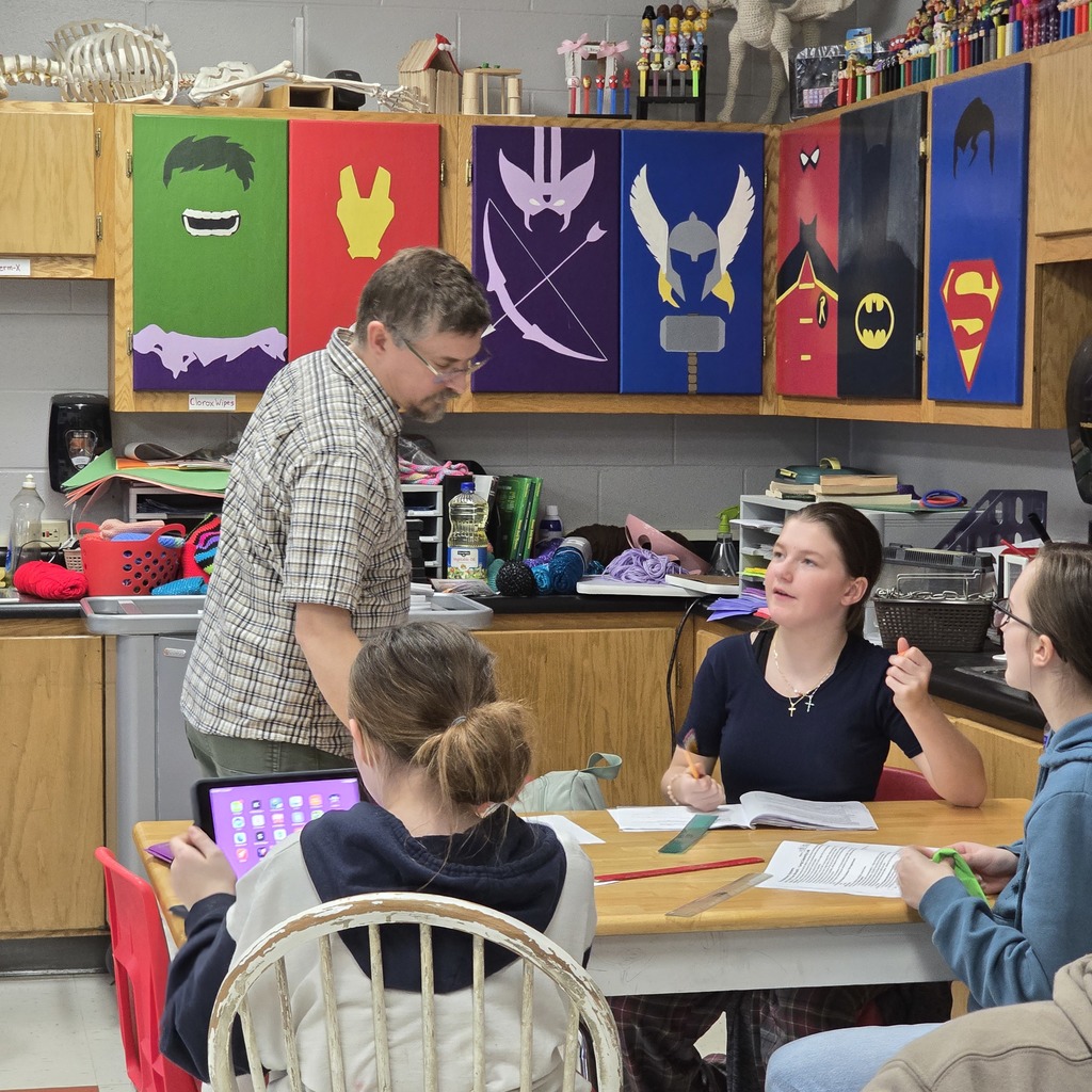 7th grade students learn about lung capacity in science class. 