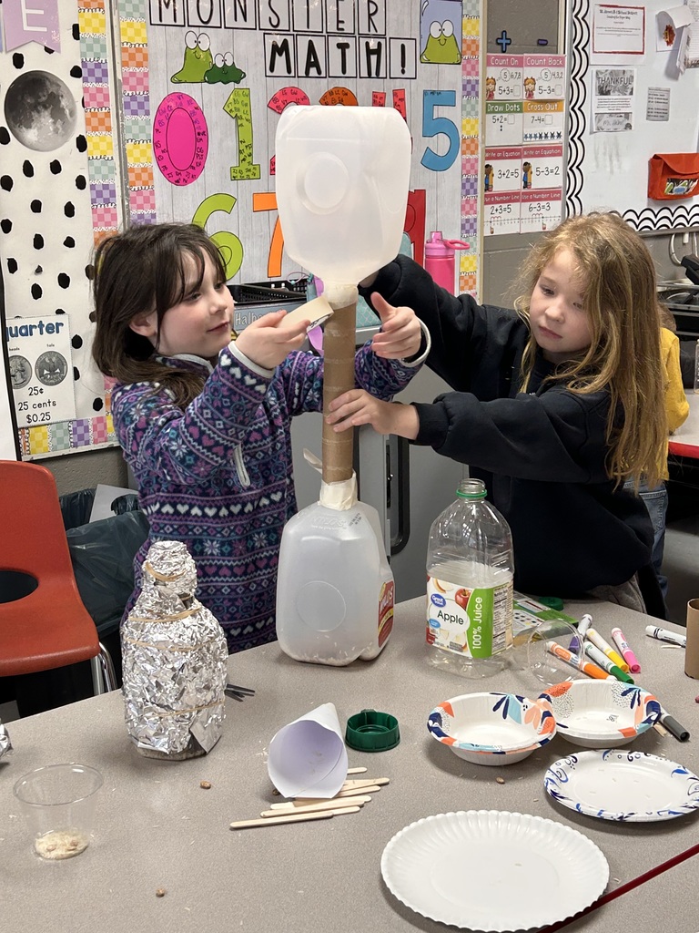 First grade students create instruments with recycled materials. 