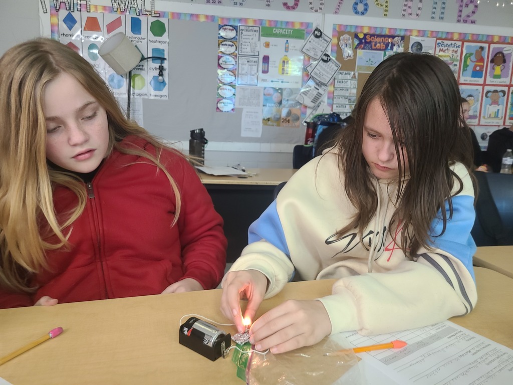 Critical Thinking with 5th grace students as they do science experiements.