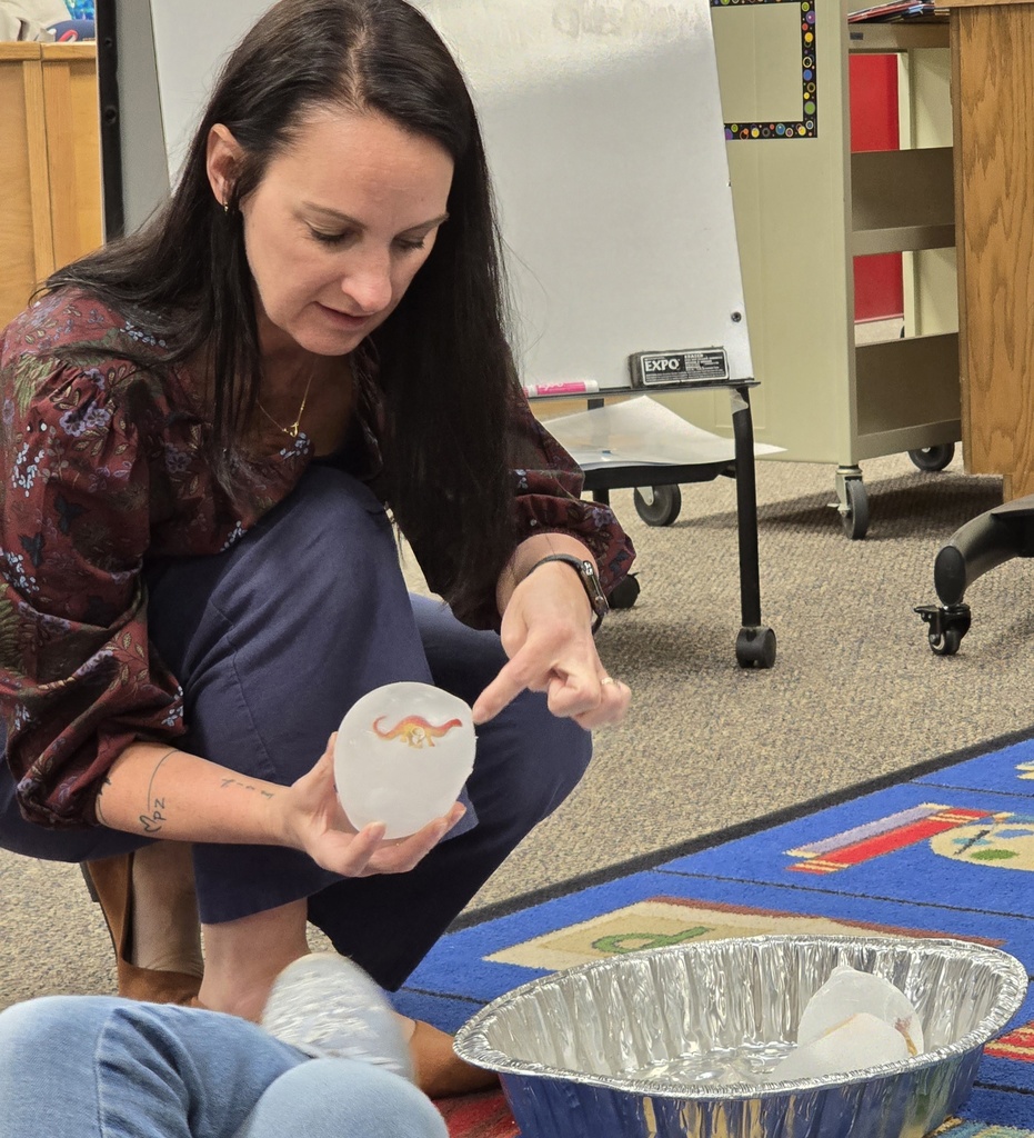 Tiger Cubs gets hands on at the library with dinosaur activity. 