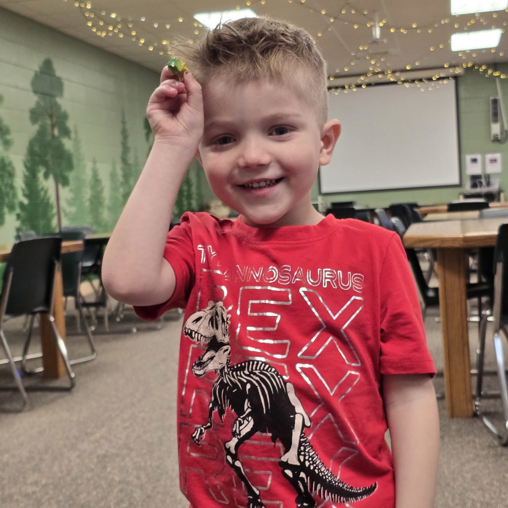 Tiger Cubs gets hands on at the library with dinosaur activity. 