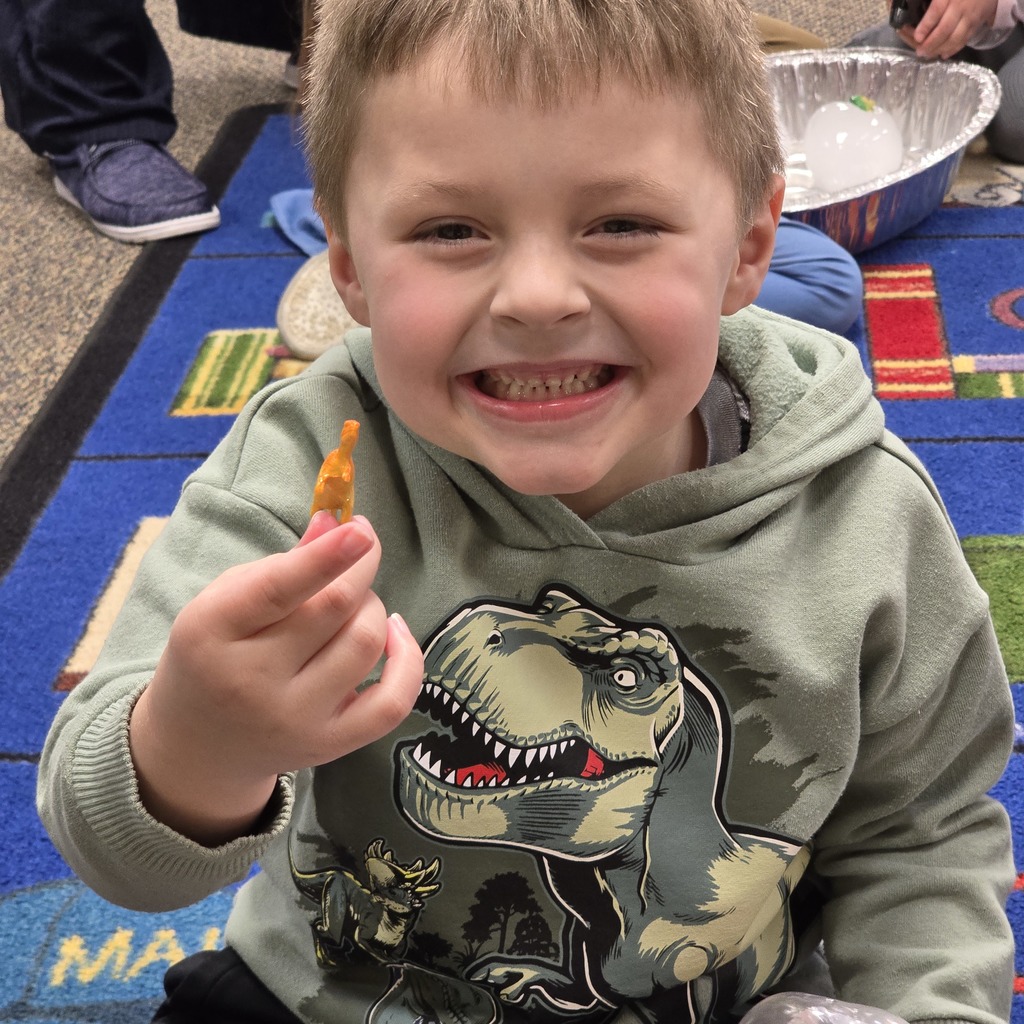 Tiger Cubs gets hands on at the library with dinosaur activity. 