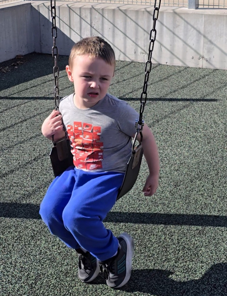 Students enjoy the warm winter weather by studying outside.