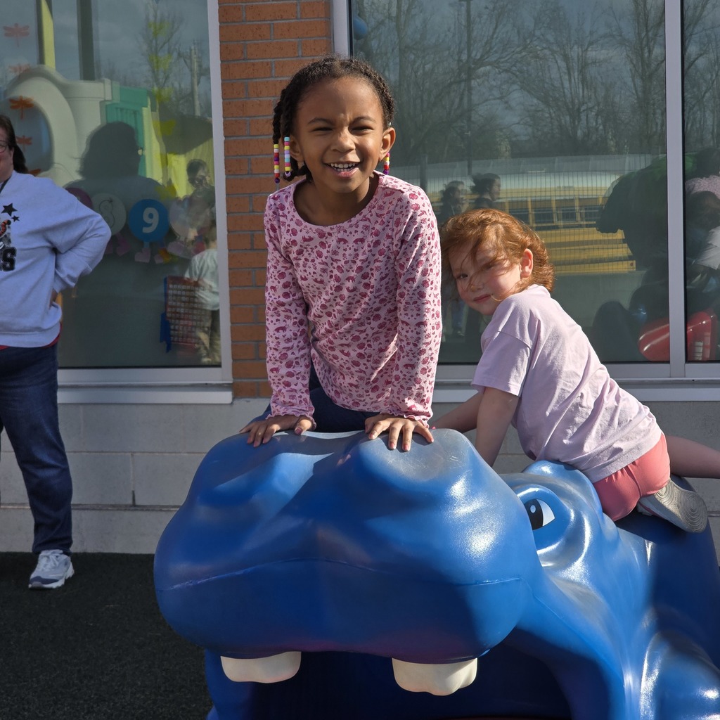 Students enjoy the warm winter weather by studying outside.